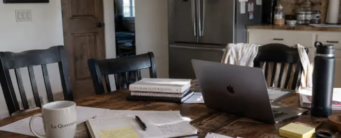 Hectic Kitchen Table with Work Stuff